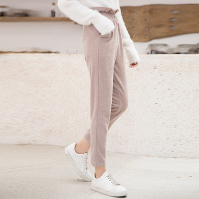 Μοντέρνα γυναικεία παντελόνια σε δύο ψηλά χρώματα μέσης και κουμπιά