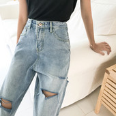 Stílusos női szakadt farmer, magas derékkal