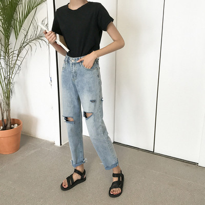 Stílusos női szakadt farmer, magas derékkal