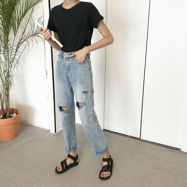 Stílusos női szakadt farmer, magas derékkal