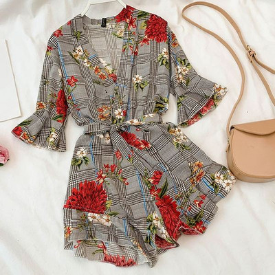 Stílusos női overál virágmotívumokkal, két színben