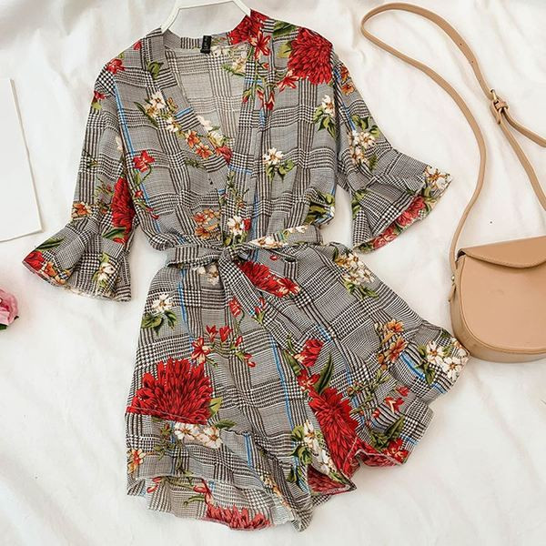 Stílusos női overál virágmotívumokkal, két színben