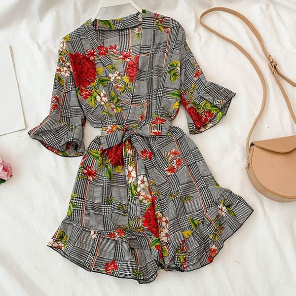 Stílusos női overál virágmotívumokkal, két színben