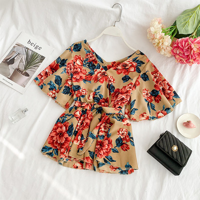 Stílusos női blúz rövid ujjal és övvel több színben