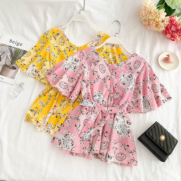 Stílusos női blúz rövid ujjal és övvel több színben