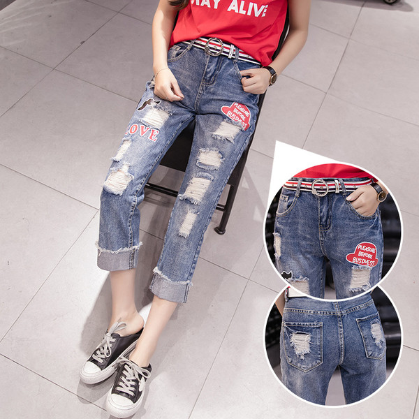 Blugi casual de dama cu motiv rupt si emblema