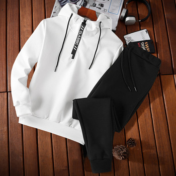 Ανδρική αθλητική ομάδα που περιλαμβάνει μαύρο και άσπρο φούτερ και παντελόνι