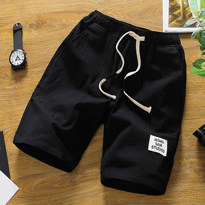 Alkalmi férfi rövidnadrág több színben emblémával és nyakkendővel