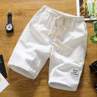 Alkalmi férfi rövidnadrág több színben emblémával és nyakkendővel