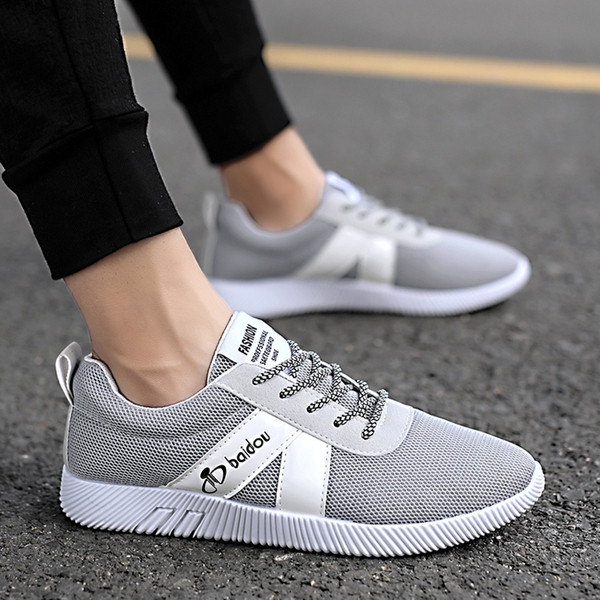 Férfi sportcipő fekete, kék és szürke színben