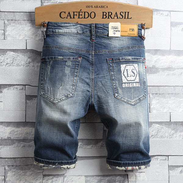 Lezser férfi rövid farmernadrág szakadt motívumokkal