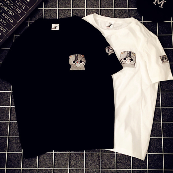 Stílusos női póló fehér és fekete hímzéssel