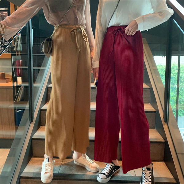 Pantaloni casual dama plisati cu talie inalta