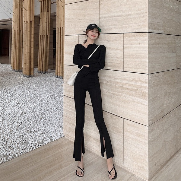 Stílusos női nadrág magas derékkal és hasítékkal