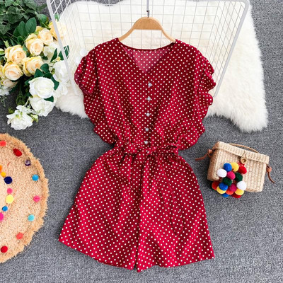 Stílusos rövid női jumpsuit piros, kék és fehér övvel