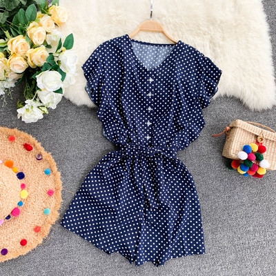 Stílusos rövid női jumpsuit piros, kék és fehér övvel