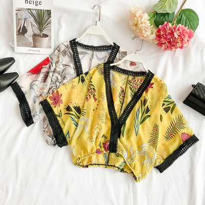 Modern női blúz mély nyakkivágással, több színben