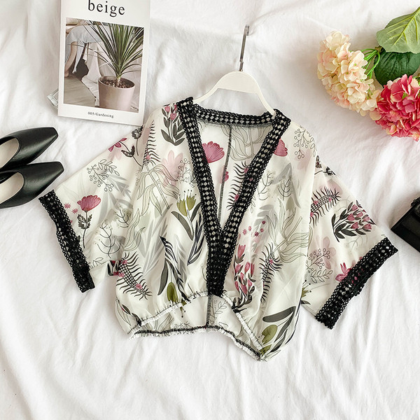 Modern női blúz mély nyakkivágással, több színben