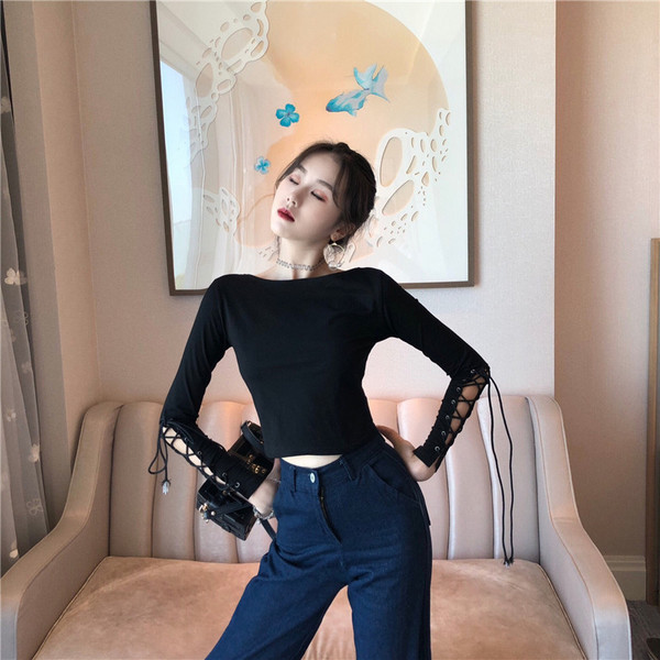 Alkalmi női rövid fekete blúz ujjkötővel