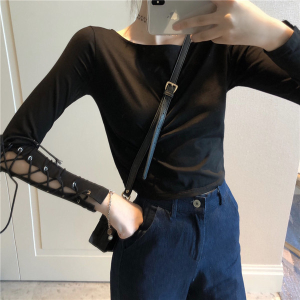 Alkalmi női rövid fekete blúz ujjkötővel