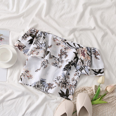 Rövid tavaszi felső több színben virágos motívumokkal