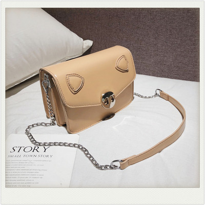 Modern női táska eko bőrből, hosszú füllel