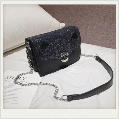 Modern női táska eko bőrből, hosszú füllel