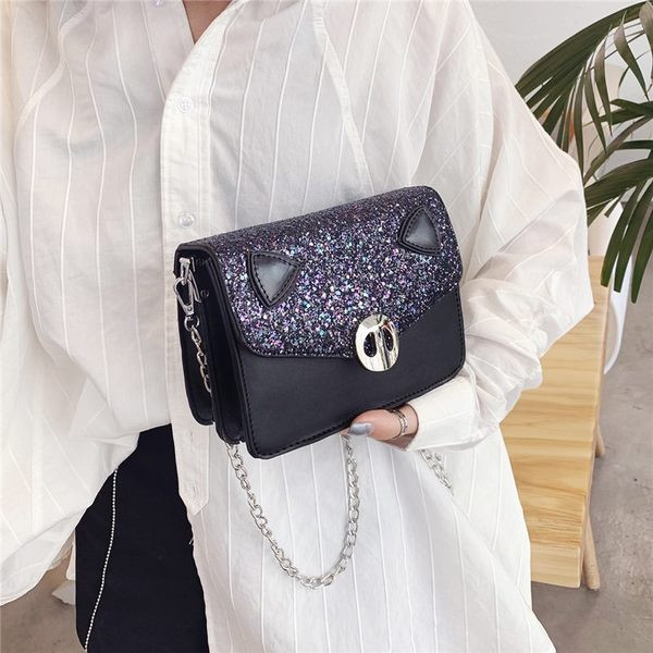 Modern női táska eko bőrből, hosszú füllel