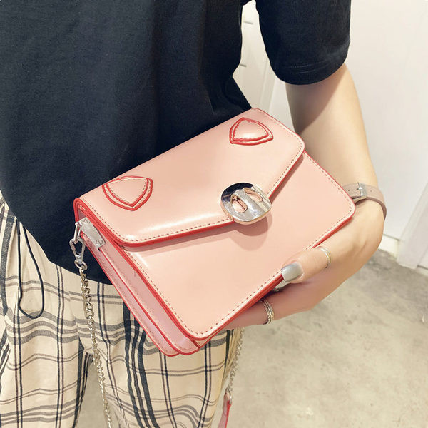 Modern női táska eko bőrből, hosszú füllel