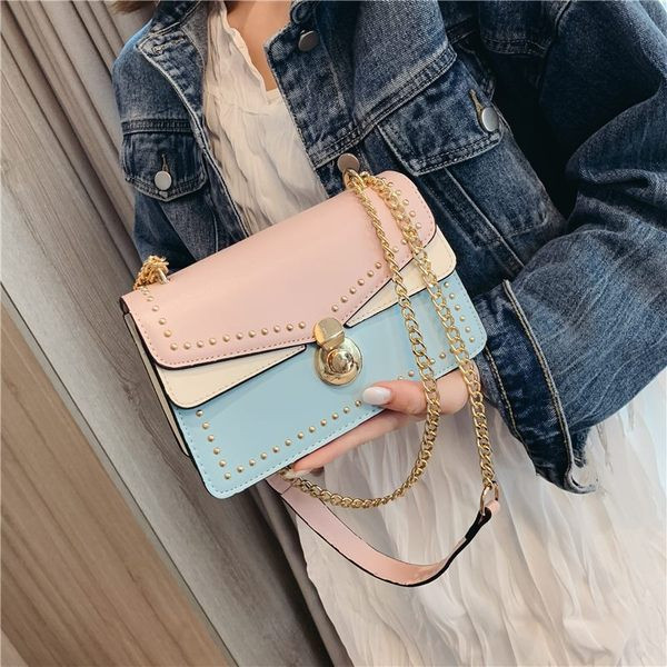 Fém díszítéssel és hosszú füllel ellátott női táska több színben