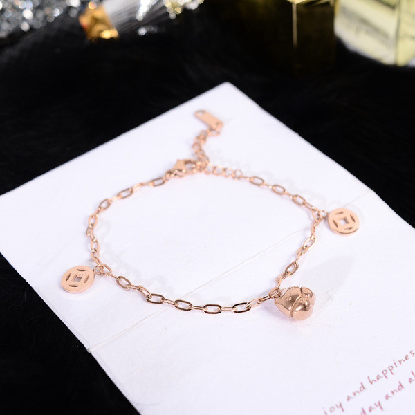 Brățară elegantă de damă cu pandantive de culoare aurie