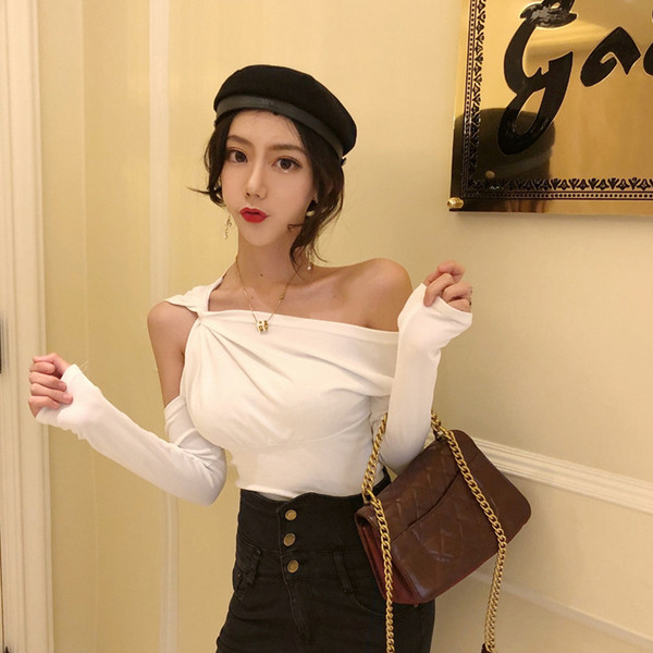 Bluză de damă modernă cu mâneci lungi în alb și negru