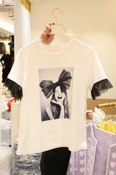 Modern női póló fehér színben