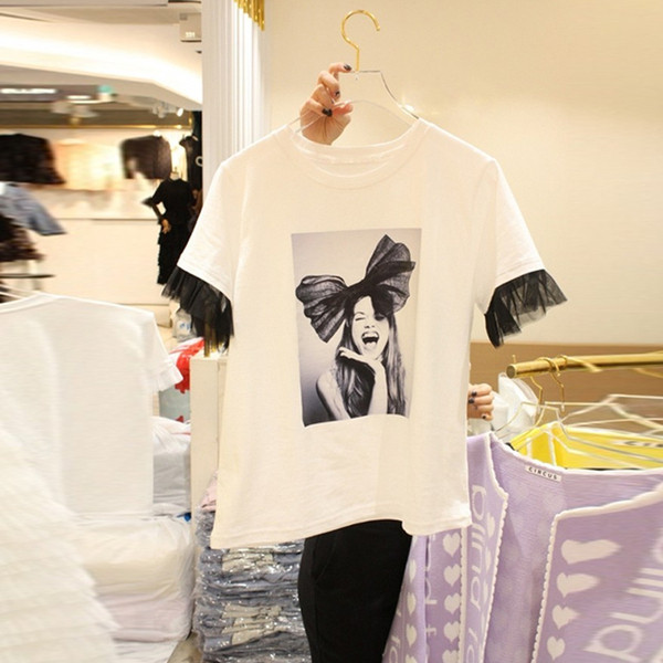 Modern női póló fehér színben