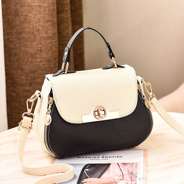 Geanta de dama moderna cu maner scurt si lung si elemente metalice in mai multe culori