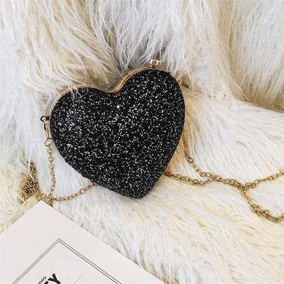 Modern női táska szív alakú, hosszú fém fogantyúval