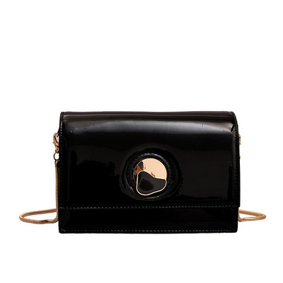 Elegáns női táska eko bőrből 3D fém elemekkel és hosszú füllel