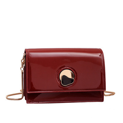 Elegáns női táska eko bőrből 3D fém elemekkel és hosszú füllel