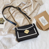 Öko bőrből készült elegáns női táska három színben, fém elemekkel