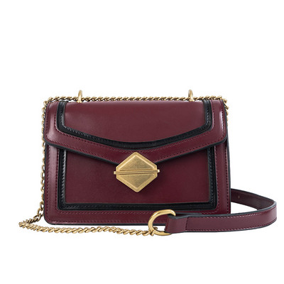 Öko bőrből készült elegáns női táska három színben, fém elemekkel