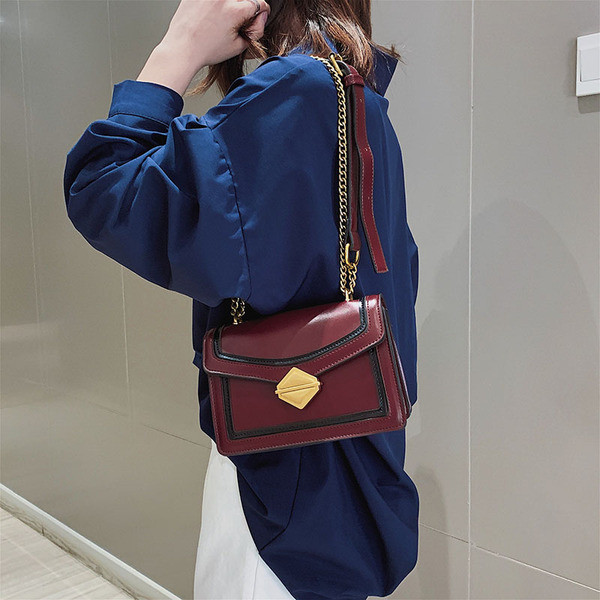 Öko bőrből készült elegáns női táska három színben, fém elemekkel