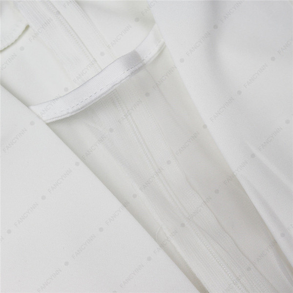 Salopetă elegantă de damă în alb și albastru și cu decolteu în V