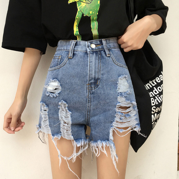 Blugi de dama moderni cu motive rupte de culoare albastra si talie inalta