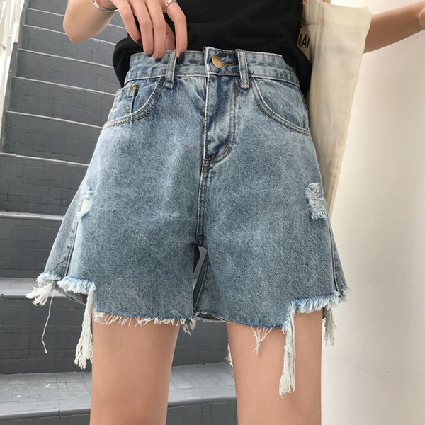 Blugi scurti de dama cu motive rupte si talie inalta in albastru