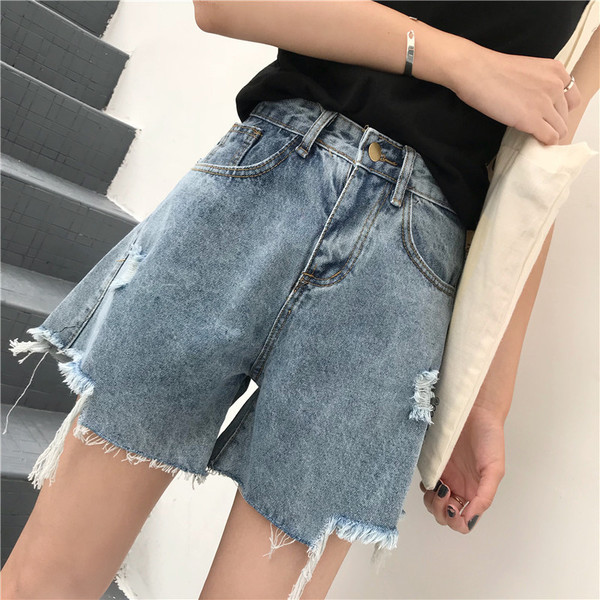 Blugi scurti de dama cu motive rupte si talie inalta in albastru