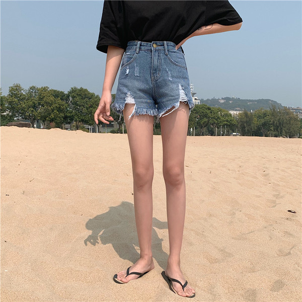 Модерни дамски дънки с висока талия и разкъсани мотиви в два цвята