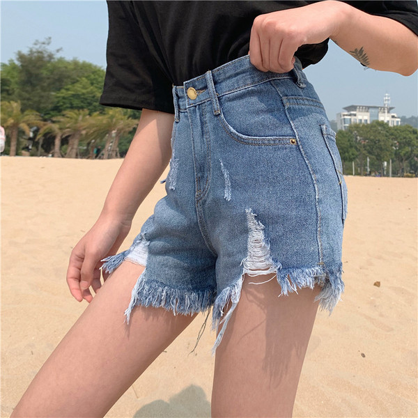 Модерни дамски дънки с висока талия и разкъсани мотиви в два цвята