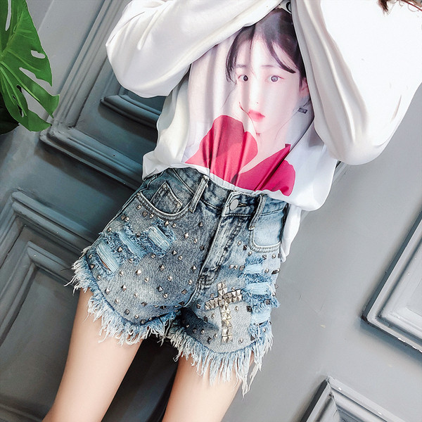 Modern női farmer kövekkel, szakadt motívumokkal, két színben