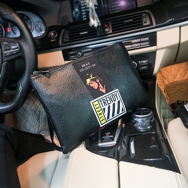 Elegáns férfi táska fekete színben emblémával