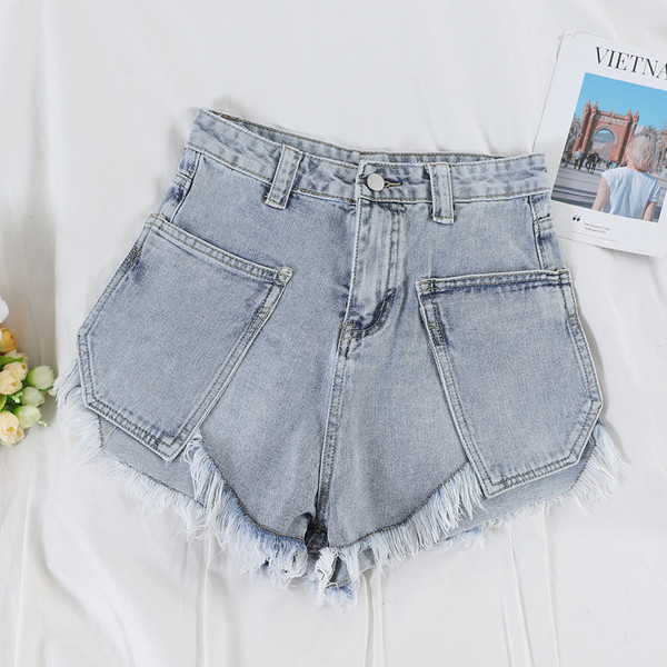 Modern női farmer rövidnadrág szakadt motívumokkal